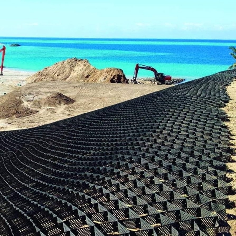 Gestructureerd met gaten HDPE Geocell Hoog Cellulair Opsluitingssysteem Honingraat HDPE Geocell voor Wegfundering Hellingbescherming Parkeerplaats Oprit Keermuur