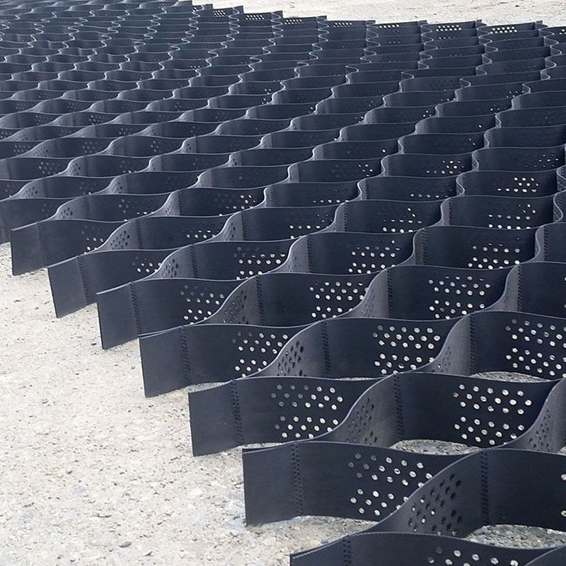 Getextureerde en geperforeerde HDPE-kunststof geocel grindrooster voor opritstabilisatie, wegfundamentversteviging, parkeerplaats en taludbescherming