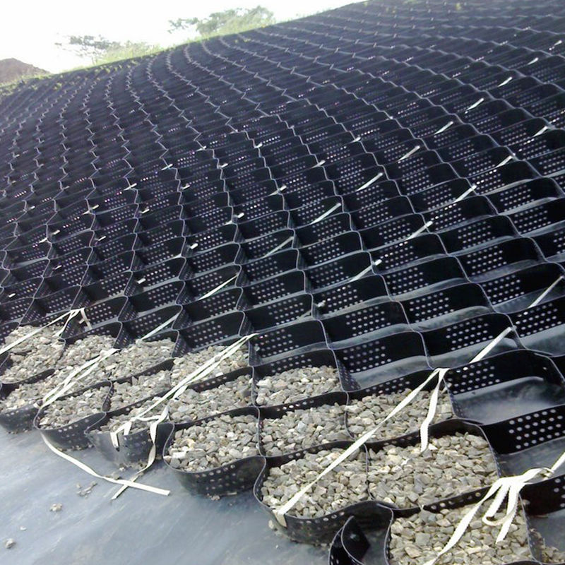 Getextureerde en geperforeerde HDPE-kunststof geocel grindrooster voor opritstabilisatie, wegfundamentversteviging, parkeerplaats en taludbescherming